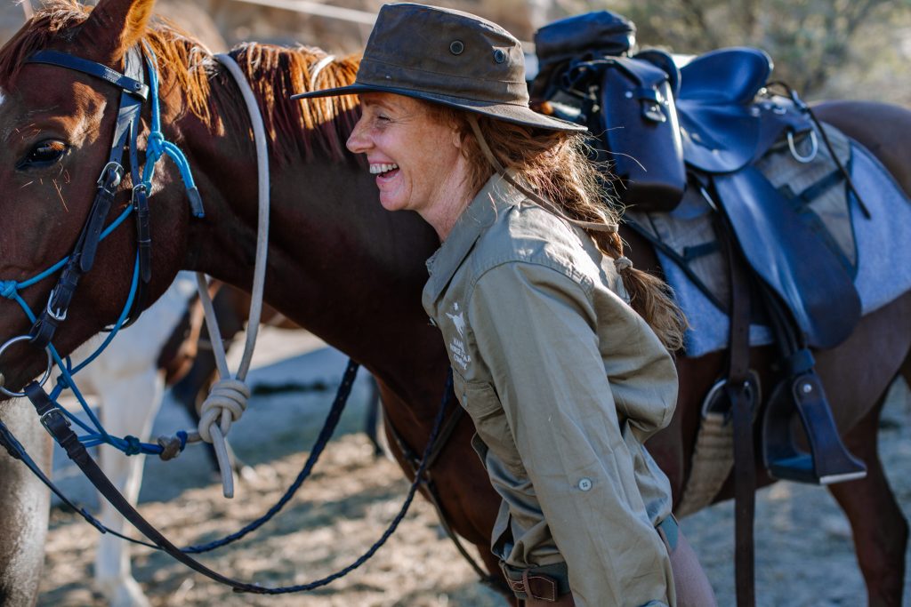 Female Rider packing for Horse back safari travel 
